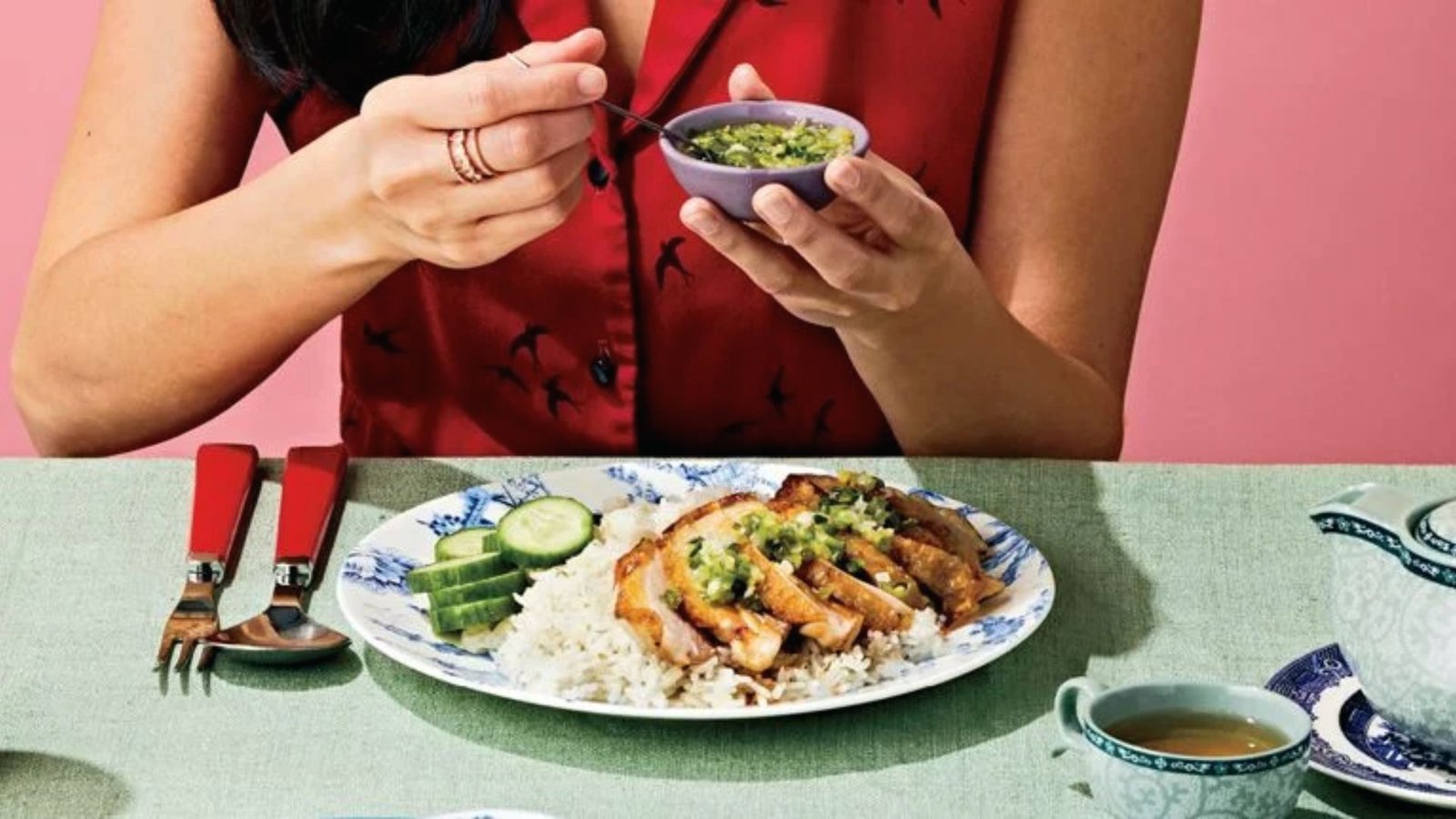 A woman is having her meal.