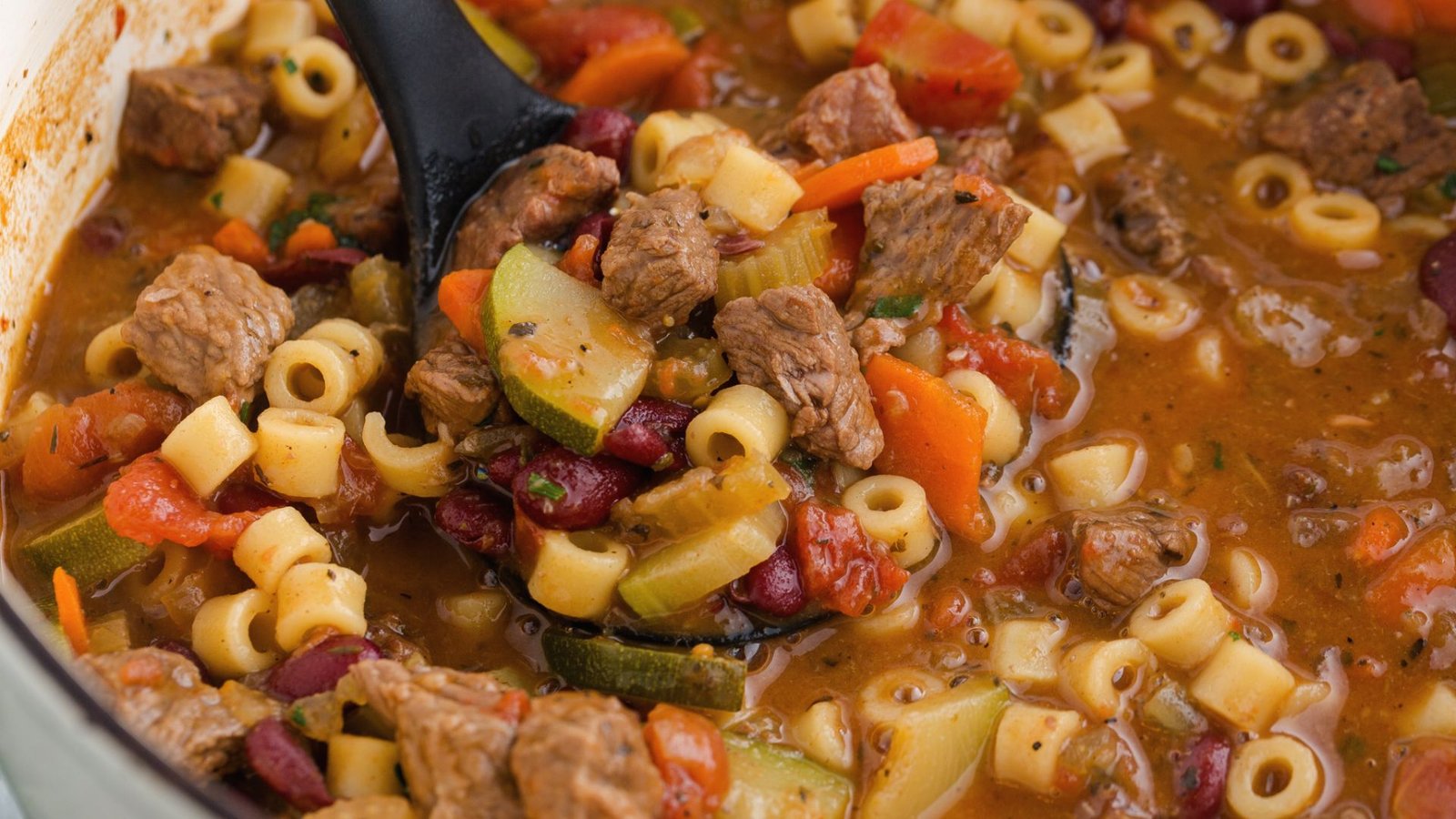 A hearty bowl of minestrone soup, perfect for storage, freezing, and reheating for future meals.