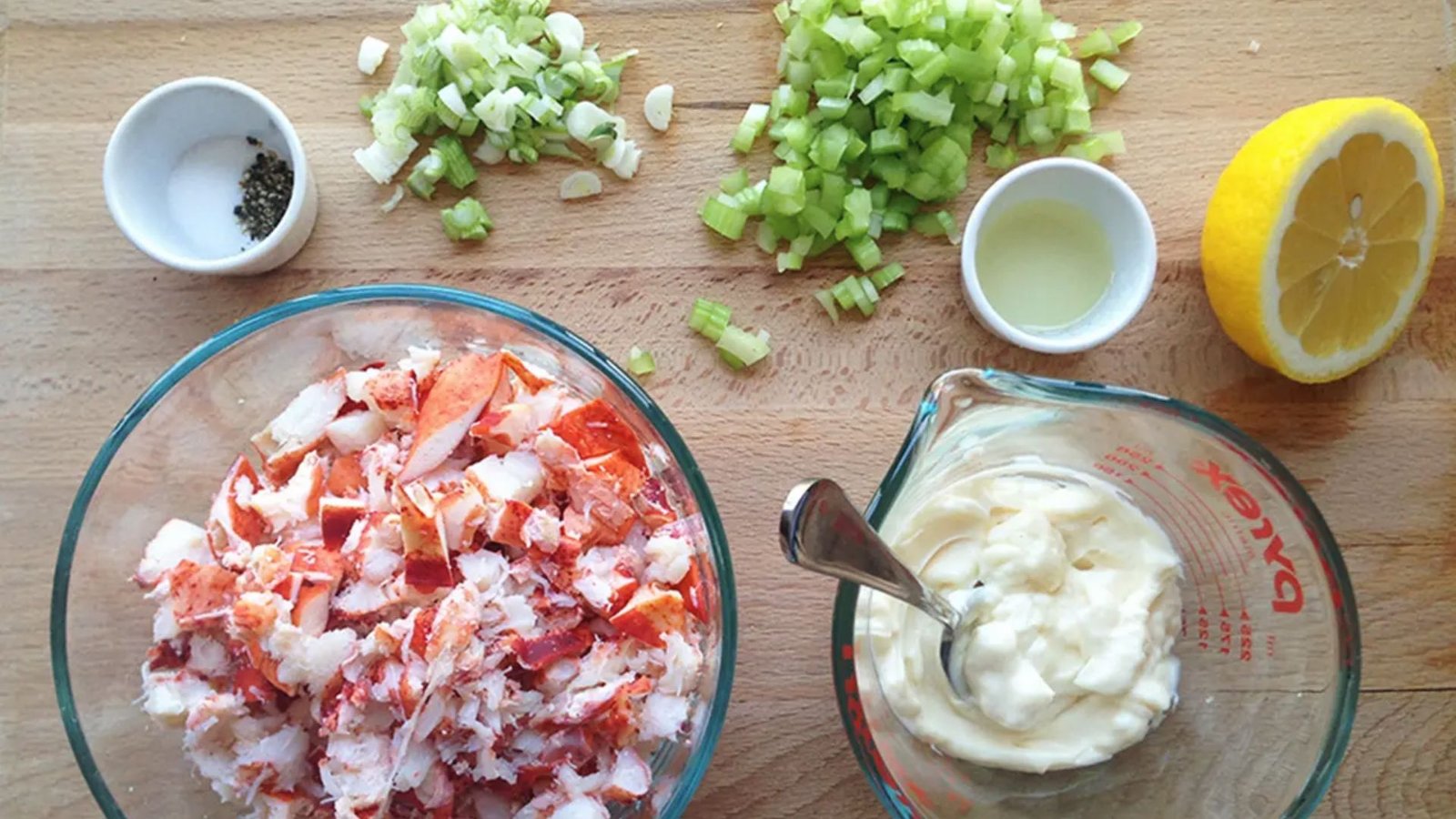 Bowls filled with ingredients for the Best Lobster Bites Recipe, ready for preparation.